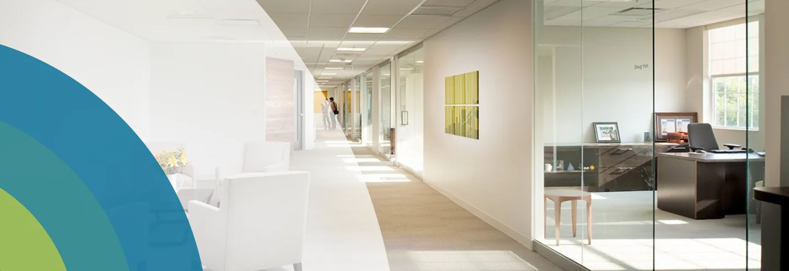 Office corridor with glass-fronted rooms, from the original HMC website